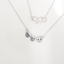 Load image into Gallery viewer, Three Skull Necklace
